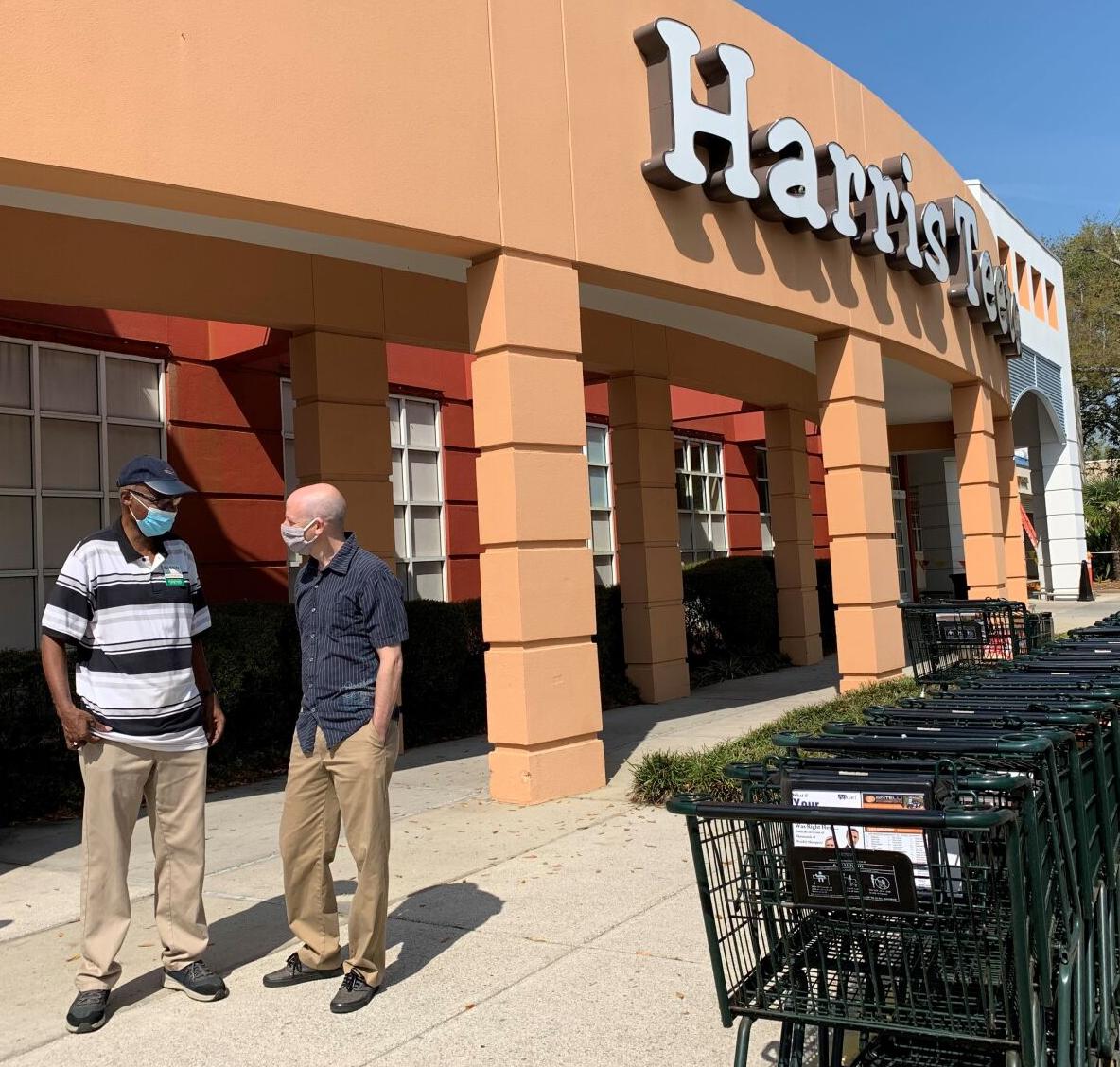 Glenn Garvin with former manager outside of the store